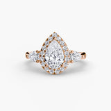 Three-stone ring with halo