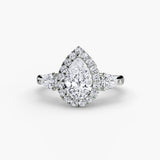 Three-stone ring with halo