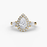 Three-stone ring with halo